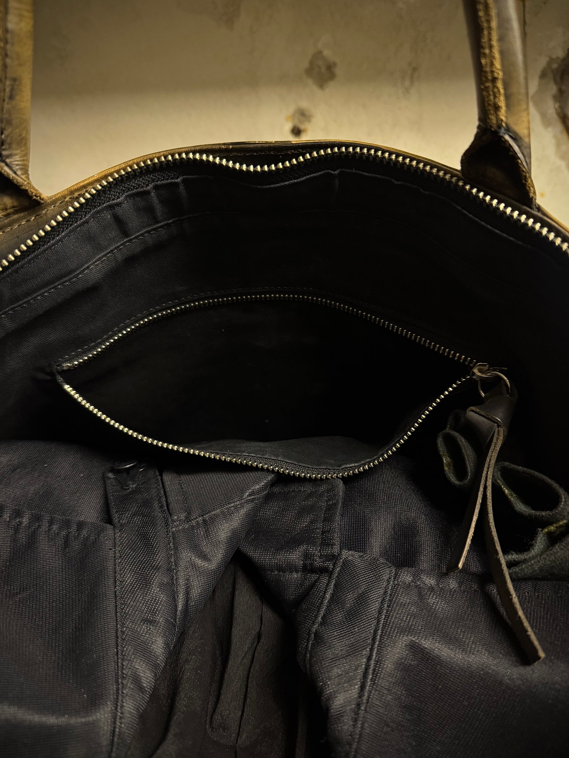 Mihara Yasuhiro AW11 'Aburidashi' Embossed Patina Mustard Kip Leather Briefcase detail | DRIEW GARMENTS