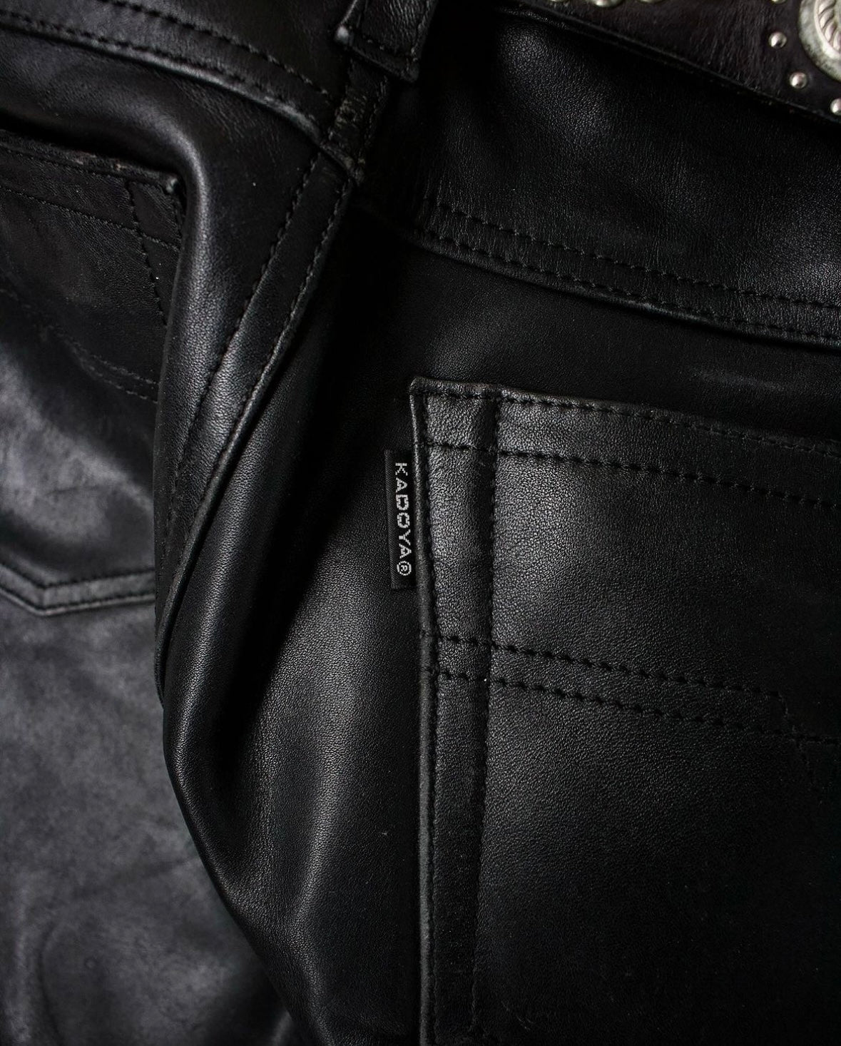 brand tag detail shot Kadoya Raw Cowhide Motorcycle Leather Pants