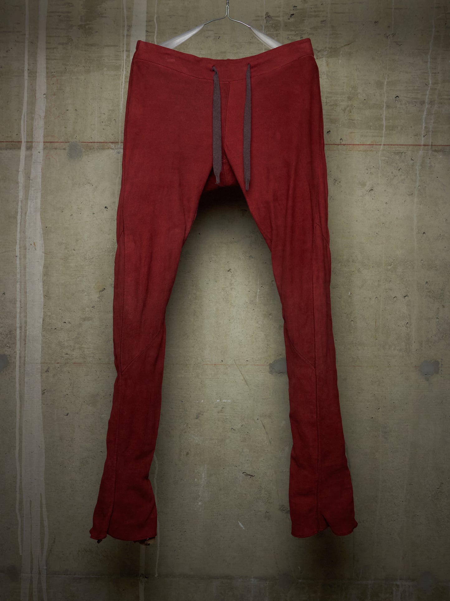 Isaac Sellam: “Experience” Brick Red Overlock Stretch Lambskin Suede Leather Jogging Pants