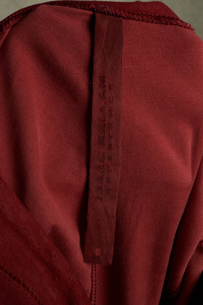 Isaac Sellam: “Experience” Brick Red Overlock Stretch Lambskin Suede Leather Jogging Pants