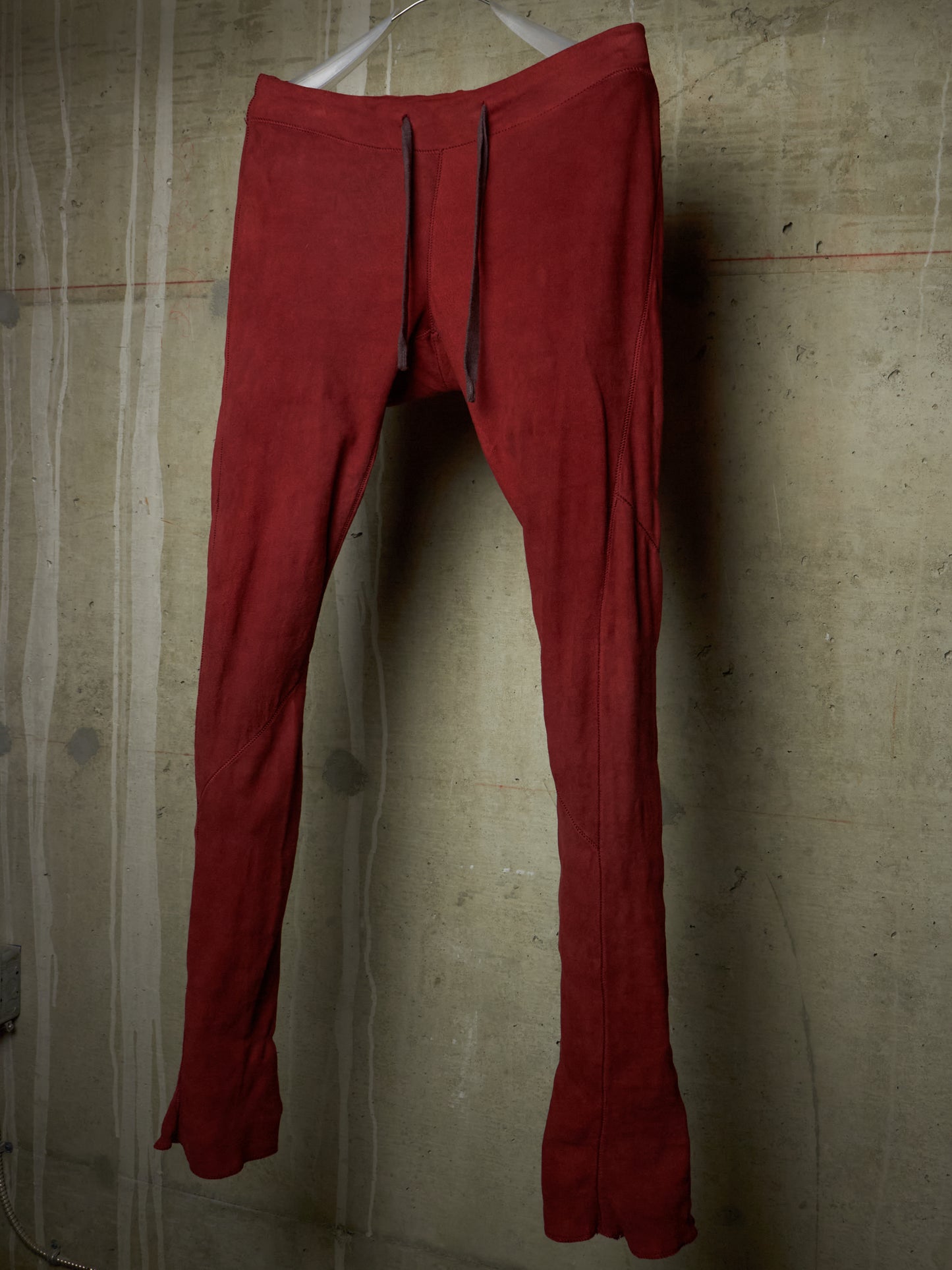 Isaac Sellam: “Experience” Brick Red Overlock Stretch Lambskin Suede Leather Jogging Pants