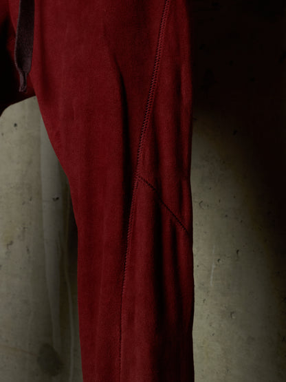 Isaac Sellam: “Experience” Brick Red Overlock Stretch Lambskin Suede Leather Jogging Pants