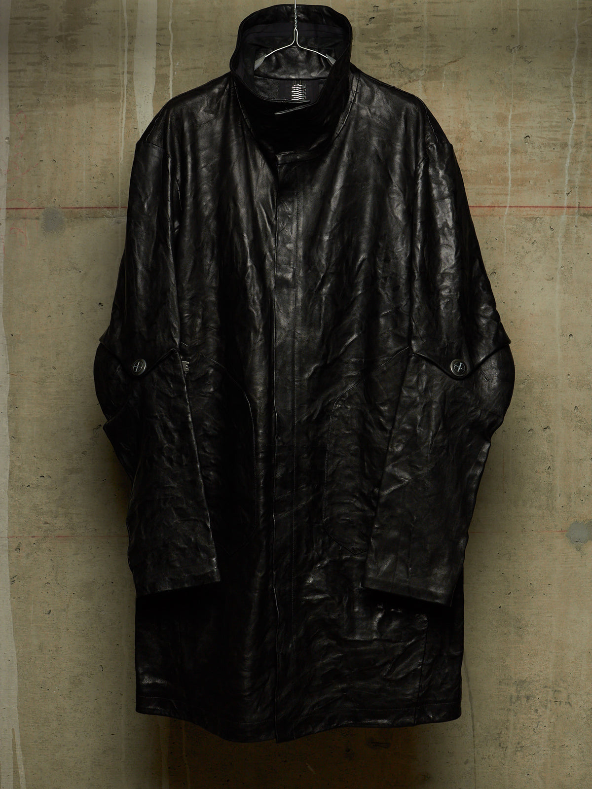 Isaac Sellam: “Experience” SS22 Black High Neck Pertinent Lambskin Leather Coat