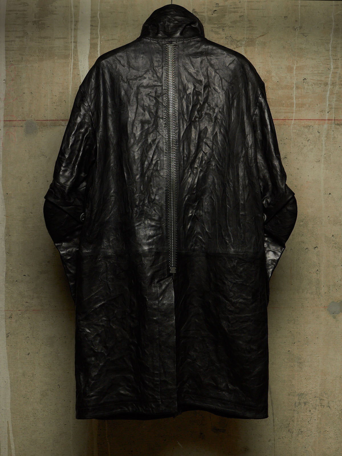 Isaac Sellam: “Experience” SS22 Black High Neck Pertinent Lambskin Leather Coat