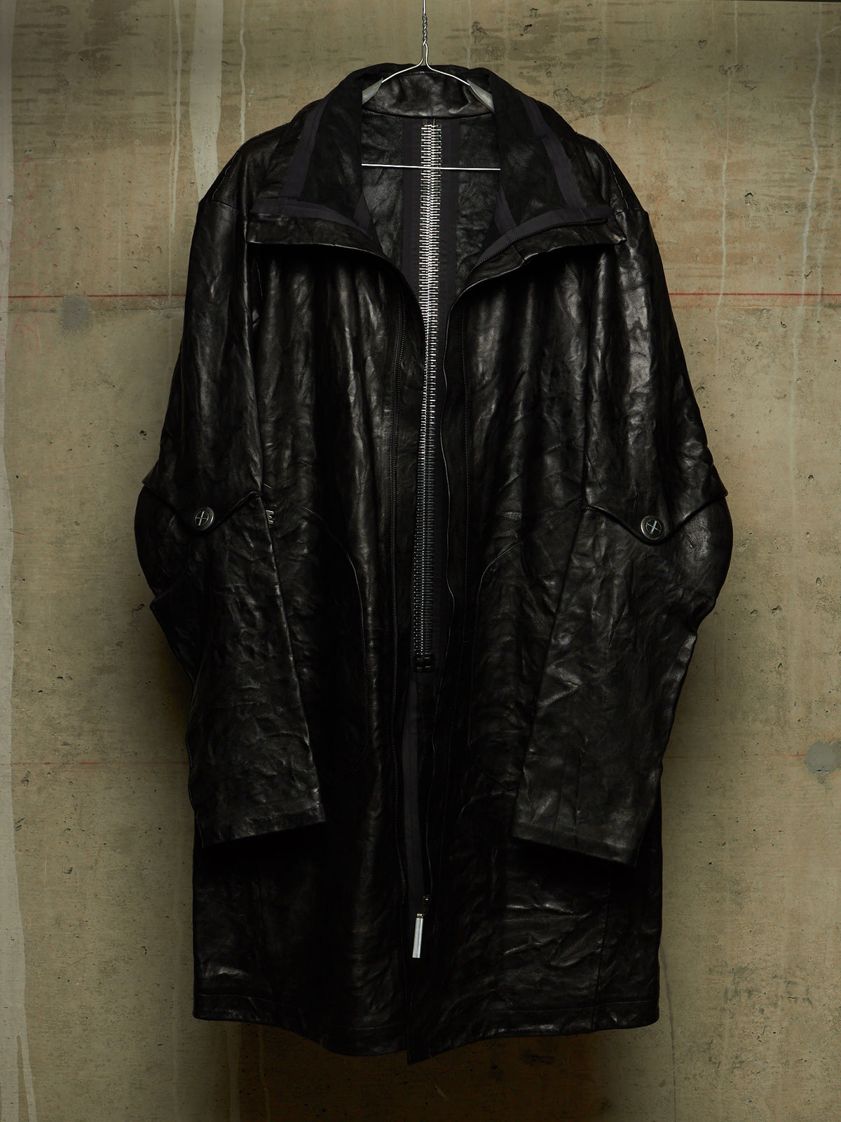 Isaac Sellam: “Experience” SS22 Black High Neck Pertinent Lambskin Leather Coat