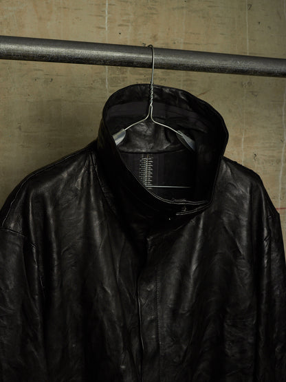 Isaac Sellam: “Experience” SS22 Black High Neck Pertinent Lambskin Leather Coat