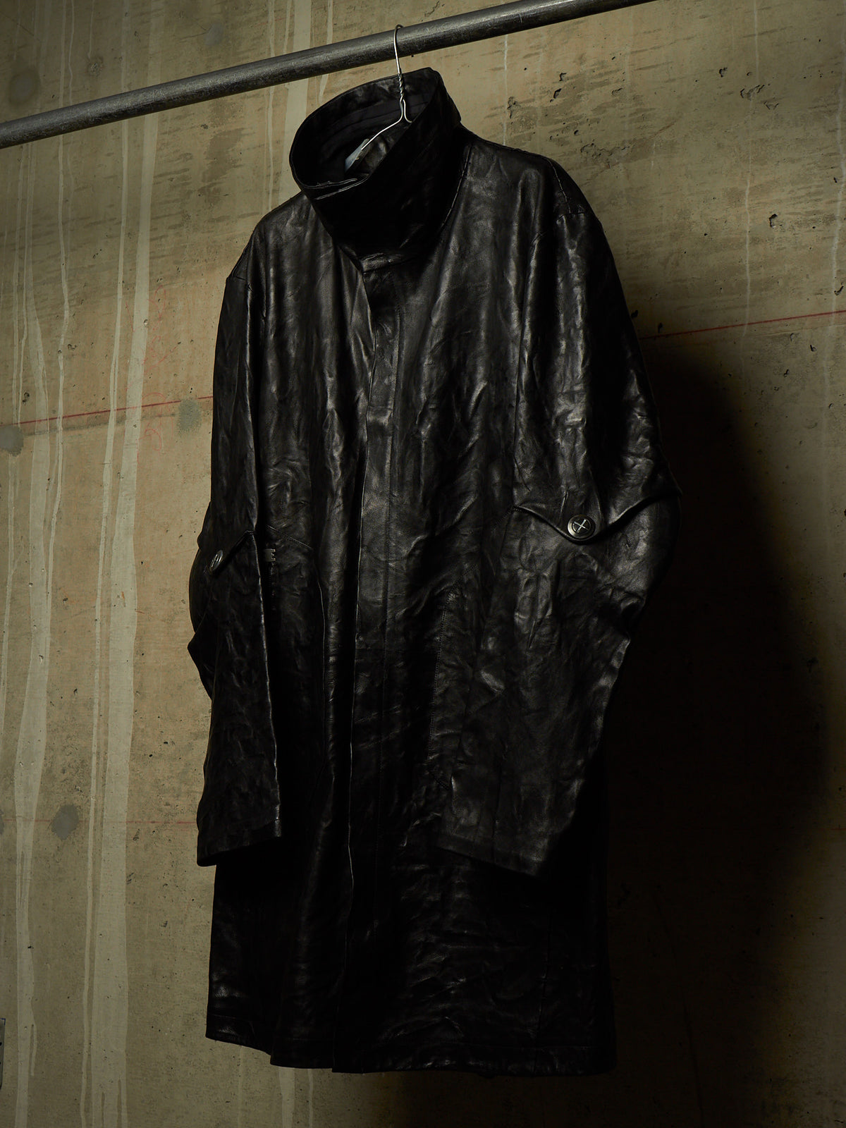 Isaac Sellam: “Experience” SS22 Black High Neck Pertinent Lambskin Leather Coat