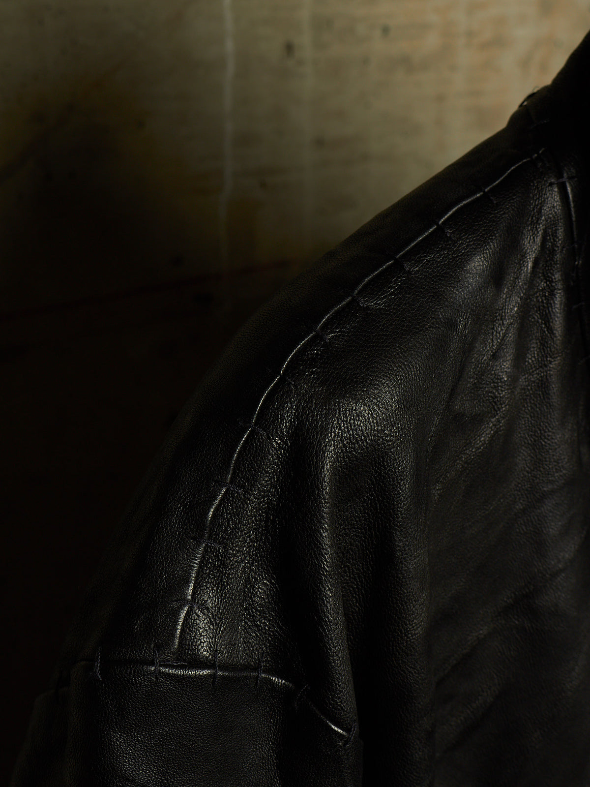 Isaac Sellam: “Experience” SS22 Black High Neck Pertinent Lambskin Leather Coat