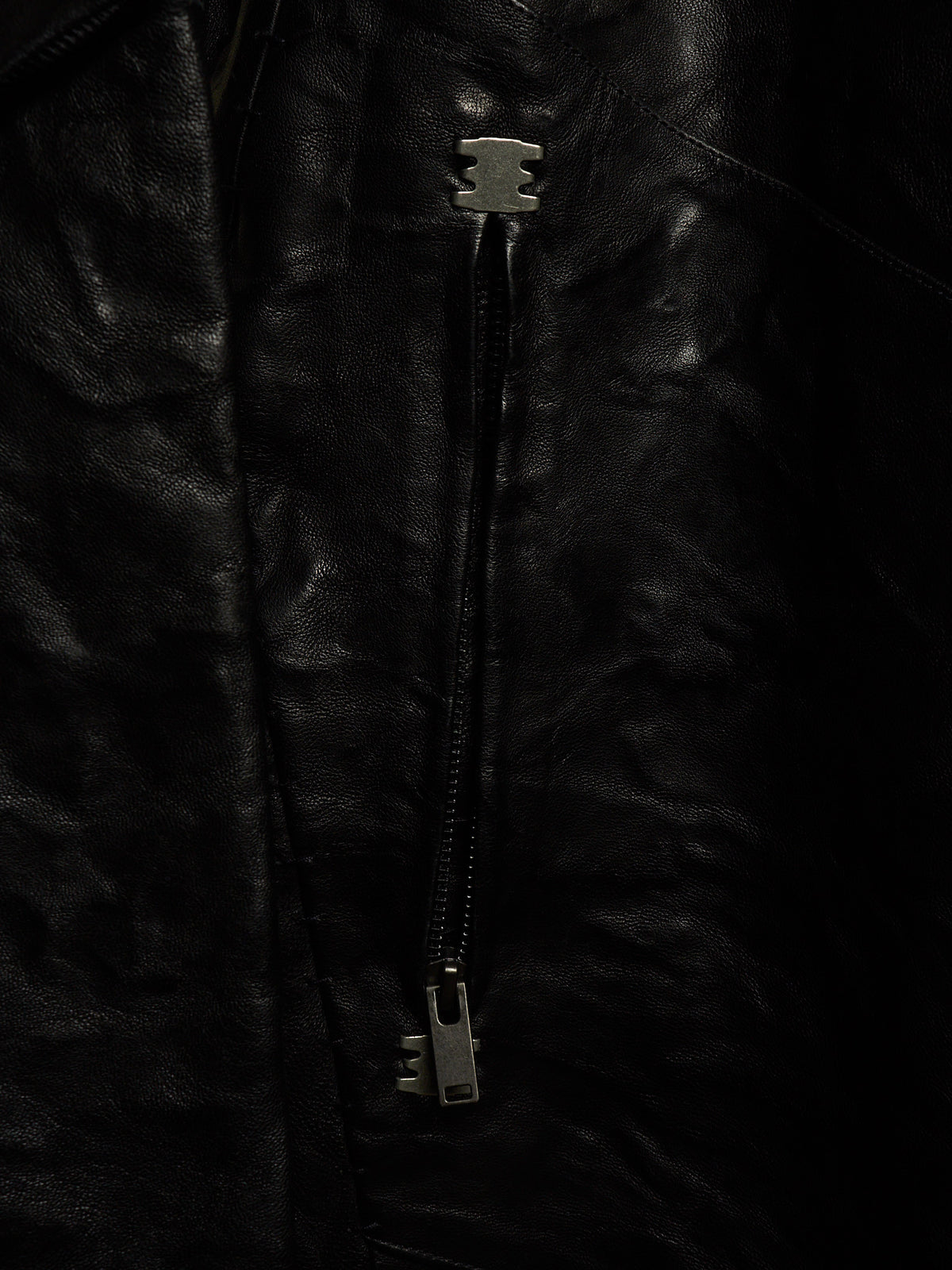 Isaac Sellam: “Experience” SS22 Black High Neck Pertinent Lambskin Leather Coat