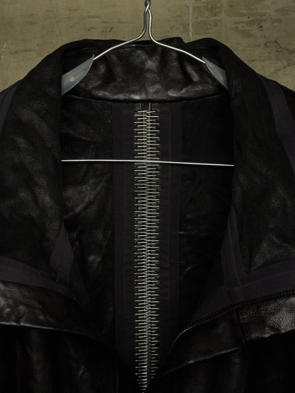 Isaac Sellam: “Experience” SS22 Black High Neck Pertinent Lambskin Leather Coat
