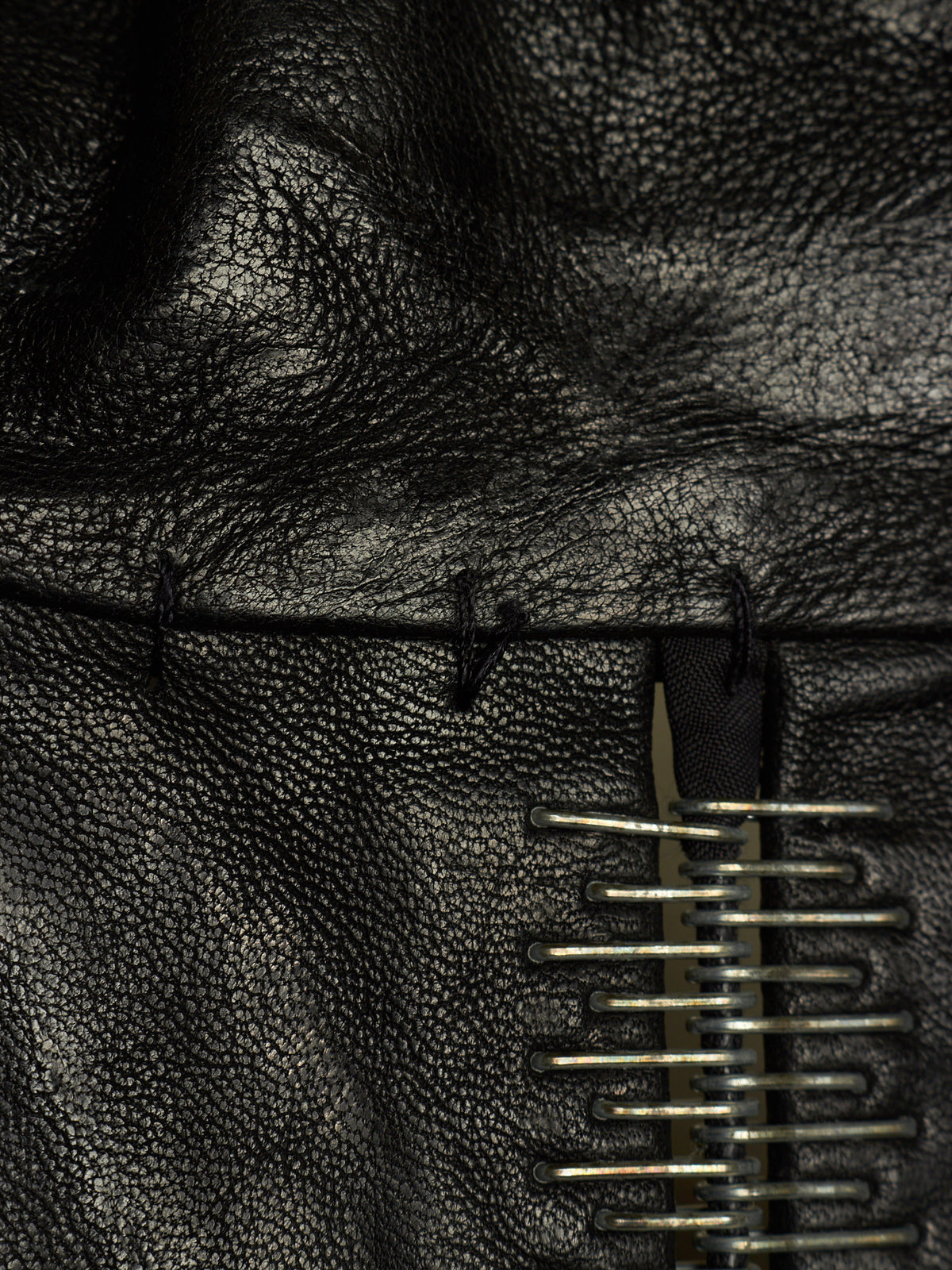 Isaac Sellam: “Experience” SS22 Black High Neck Pertinent Lambskin Leather Coat
