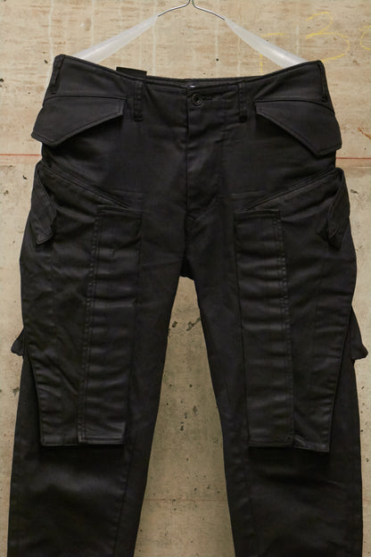Julius_7 AW16-17 "beast;" WaxCoated Vertical Gas-Mask Cargo Denim
