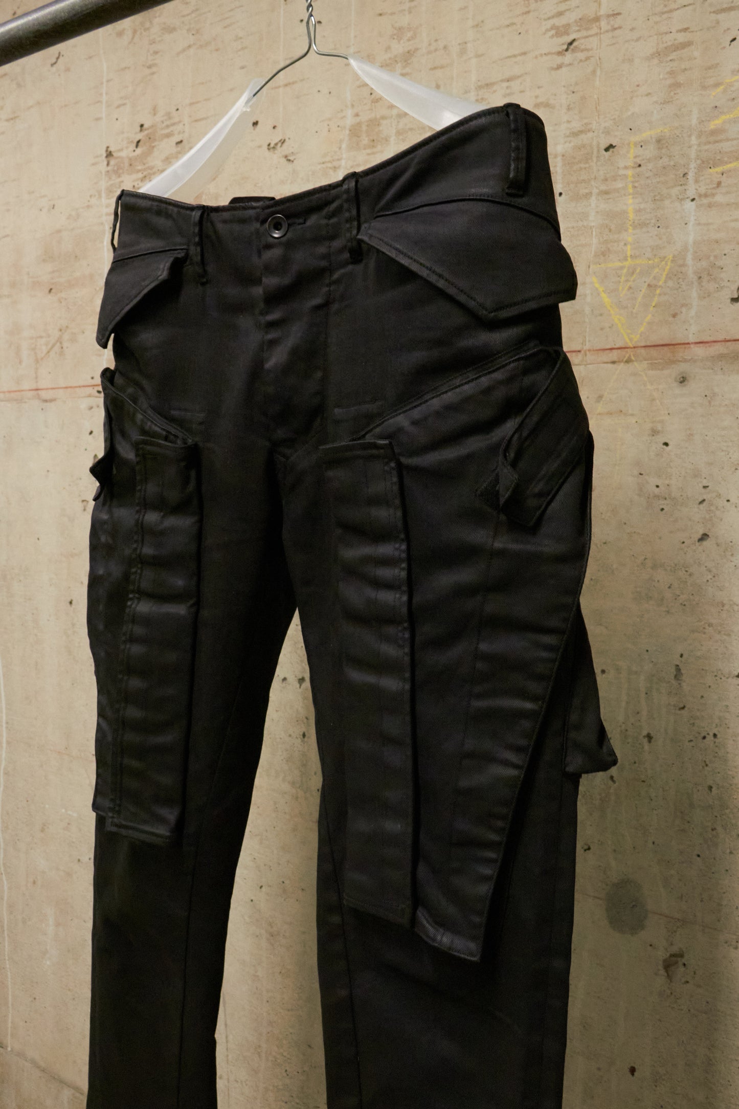 Julius_7 AW16-17 "beast;" WaxCoated Vertical Gas-Mask Cargo Denim