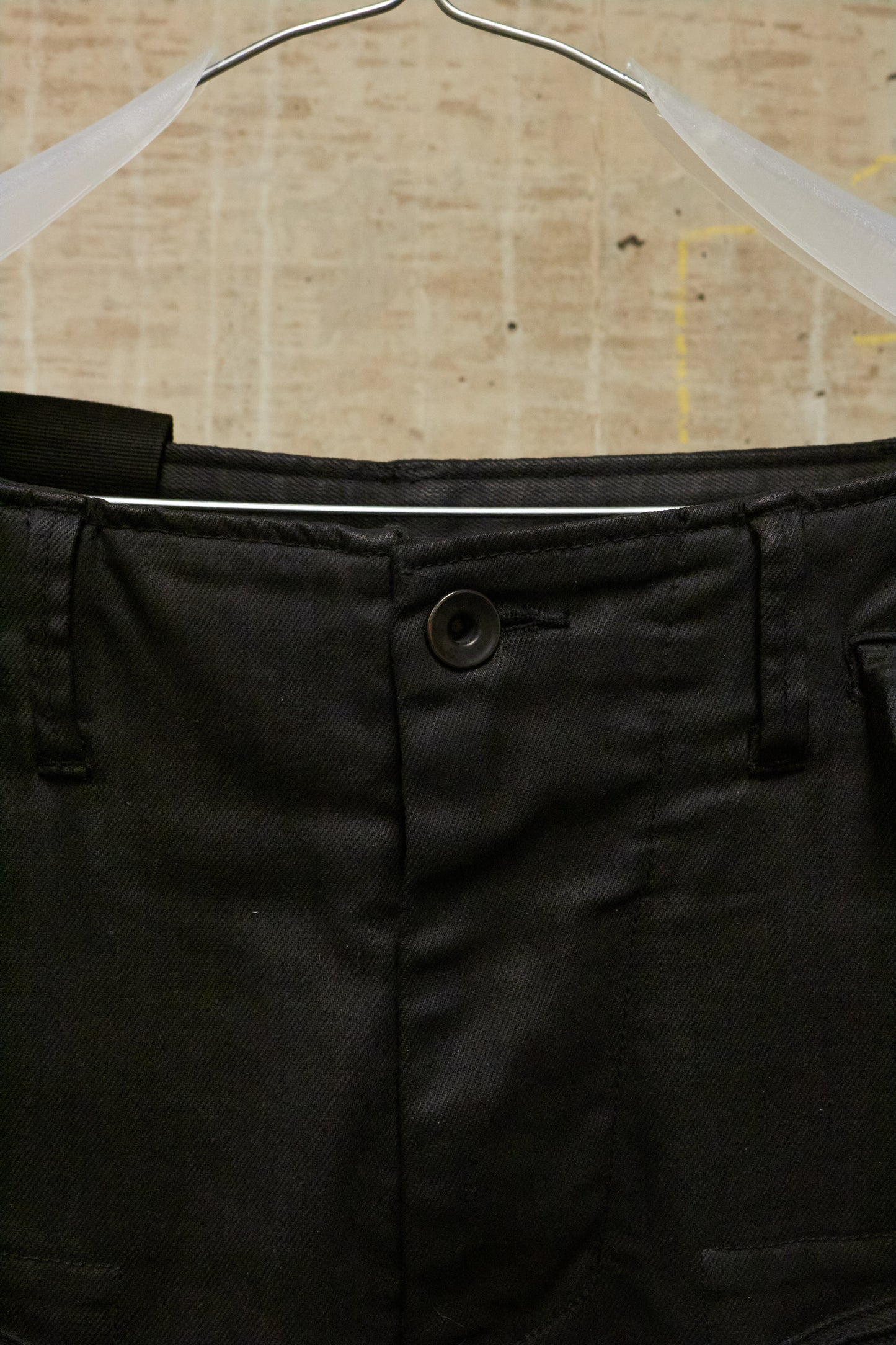Julius_7 AW16-17 "beast;" WaxCoated Vertical Gas-Mask Cargo Denim