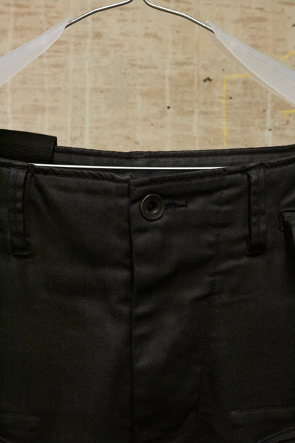 Julius_7 AW16-17 "beast;" WaxCoated Vertical Gas-Mask Cargo Denim