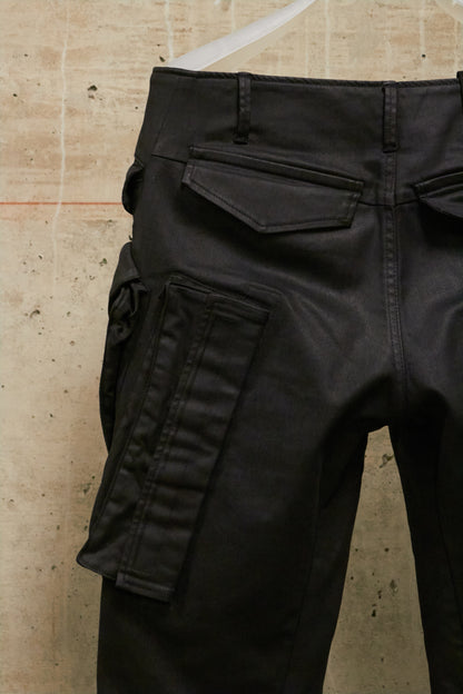 Julius_7 AW16-17 "beast;" WaxCoated Vertical Gas-Mask Cargo Denim