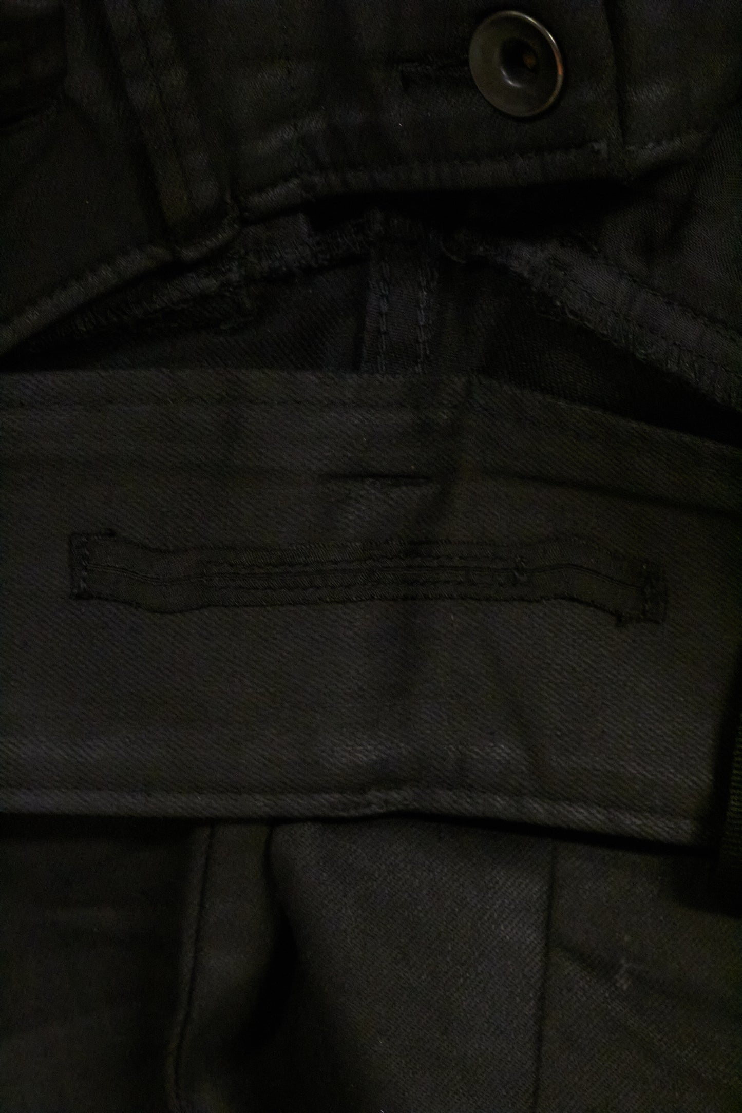 Julius_7 AW16-17 "beast;" WaxCoated Vertical Gas-Mask Cargo Denim