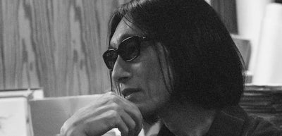 Yuichi Kuroda portrait in black and white — clothing designer blending rock, punk, and glam subcultures