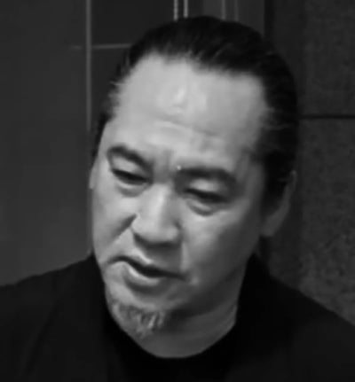 Masahiko Maruyama portrait in black and white — avant-garde minimalist fashion designer