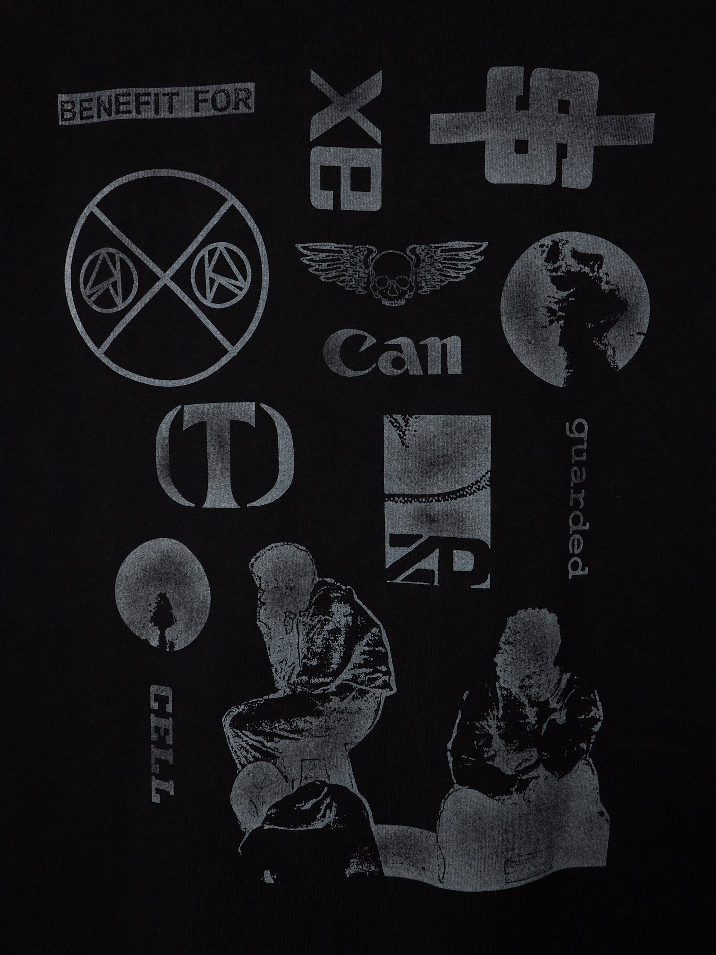 A black graphic t-shirt featuring a collection of distressed, light gray and white band logos and symbols, including Can, Xperience, and others, with silhouettes of people at the bottom.