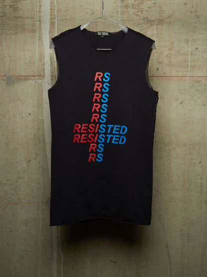 A sleeveless black tank top hanging on a wire hanger against a textured concrete wall. The front features a vertical graphic design spelling 'RESISTED' in alternating red and blue text.