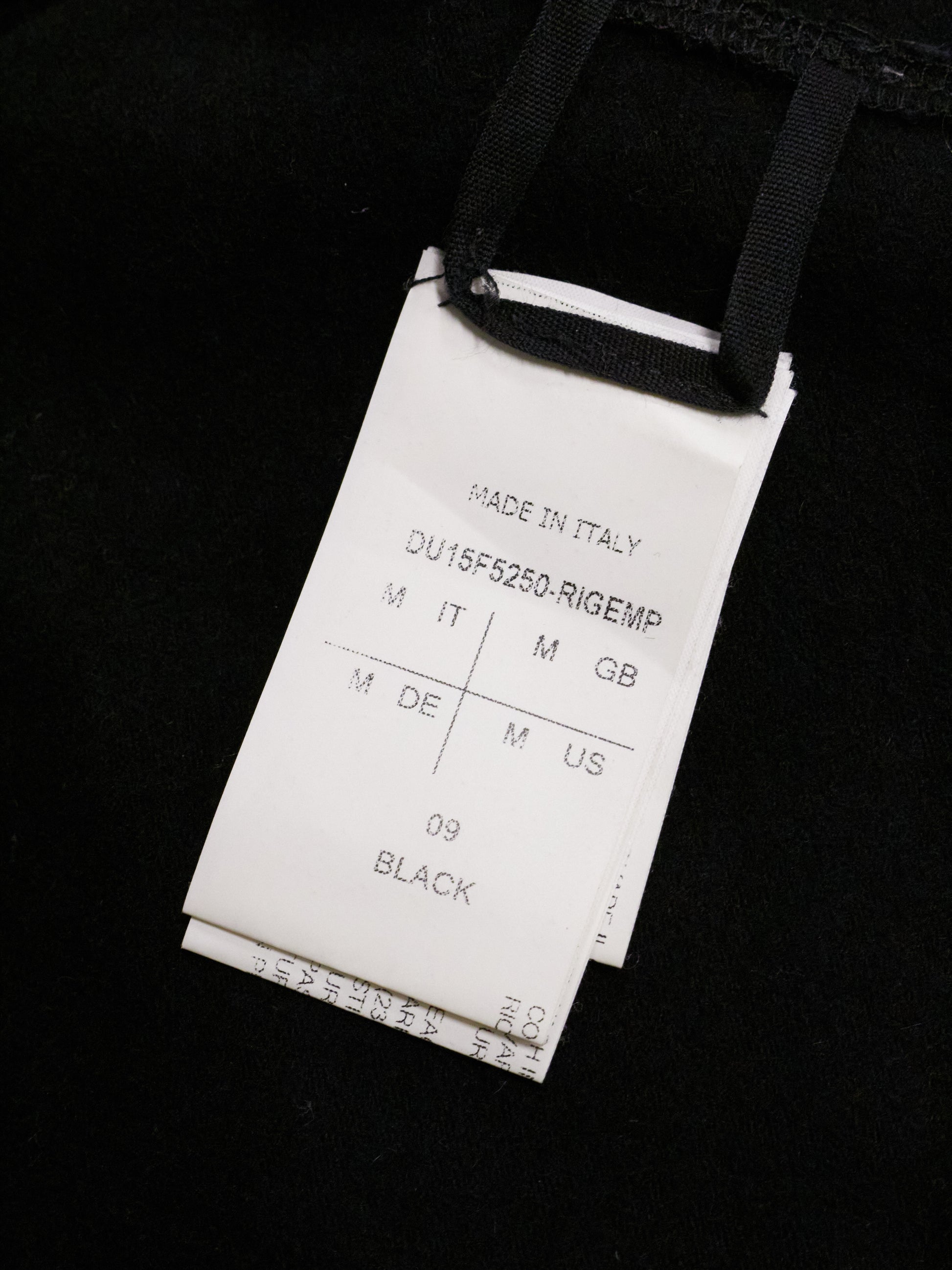 Clothing tag on a black background