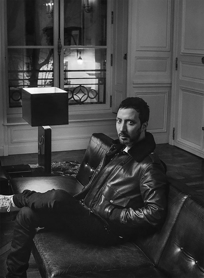 Portrait of Anthony Vaccarello, Belgian-Italian fashion designer and Creative Director of Saint Laurent, seated