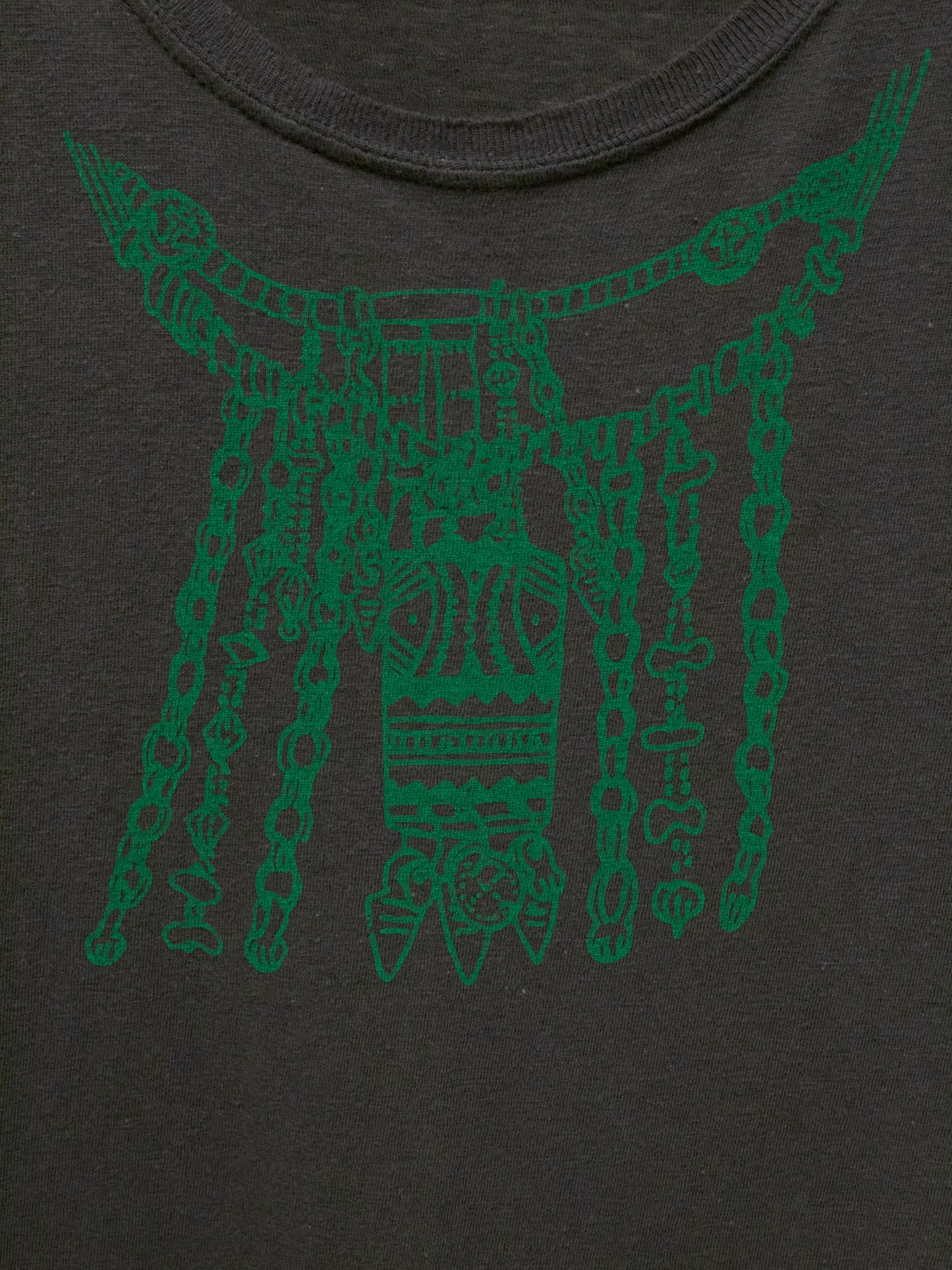 Green chain design on a black shirt