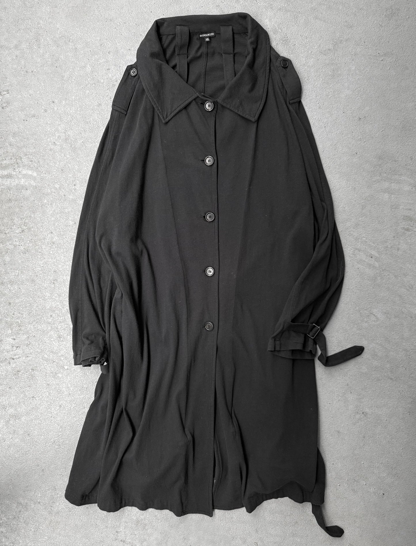 Black coat with a hood on a gray background