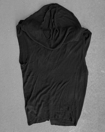 Black sleeveless shirt on a gray background