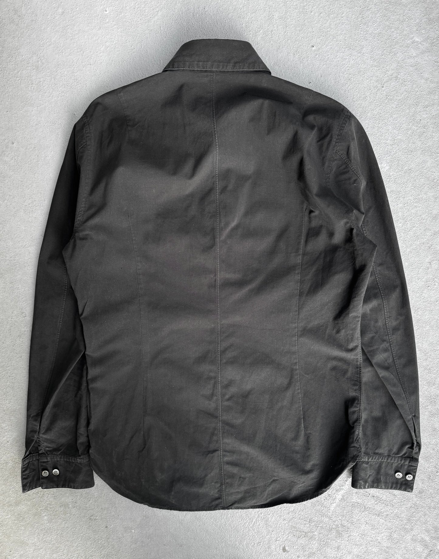 Black jacket on a gray textured background