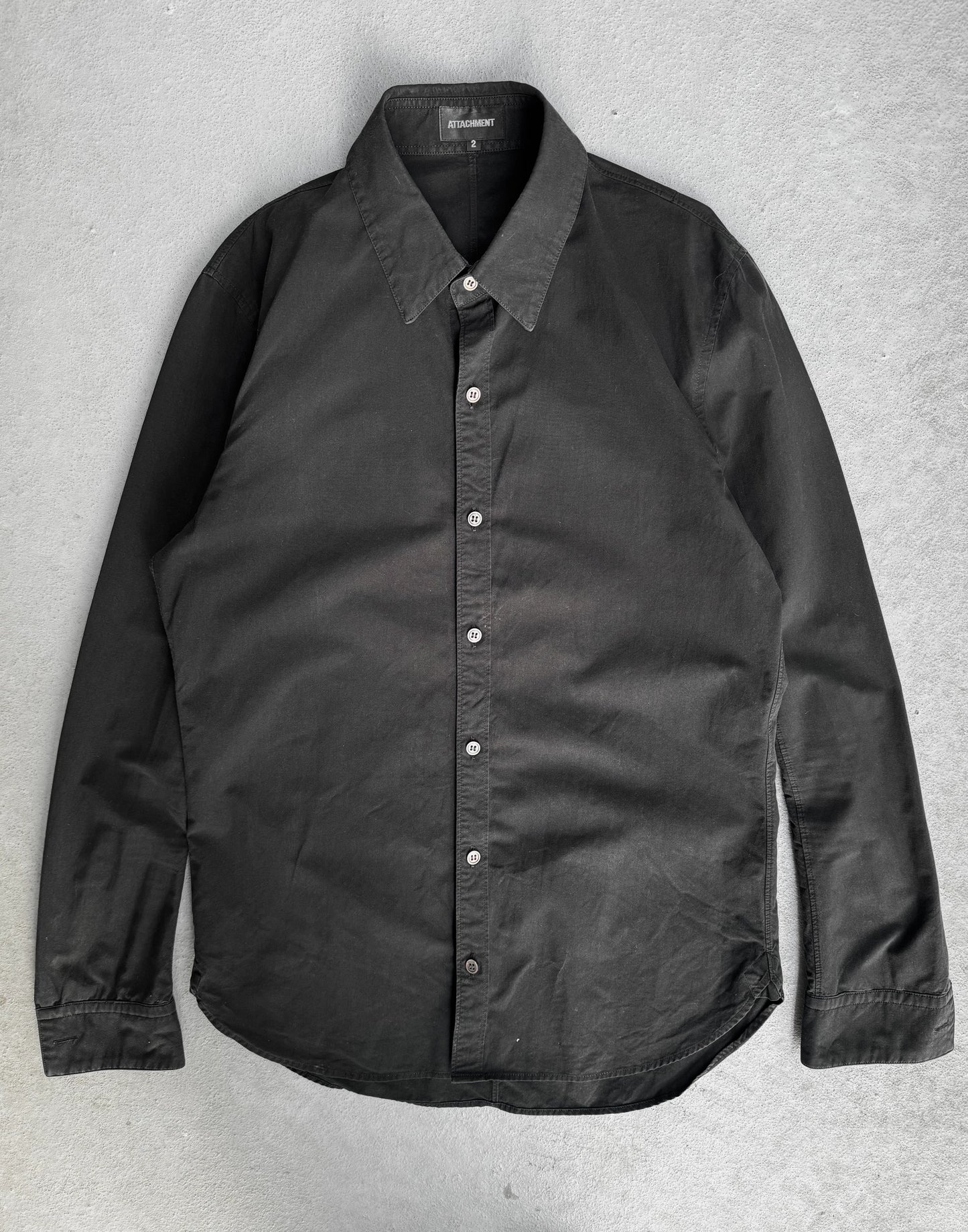 Black shirt on a gray background