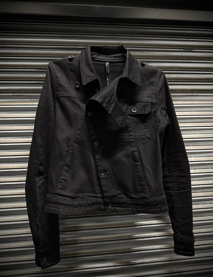 Black jacket on a metallic surface