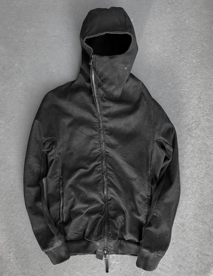 Black hooded jacket on a gray background
