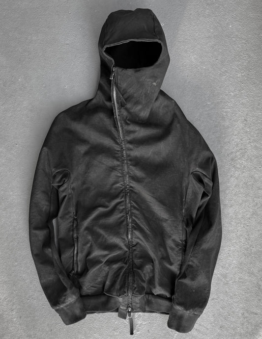 Black hooded jacket on a gray background