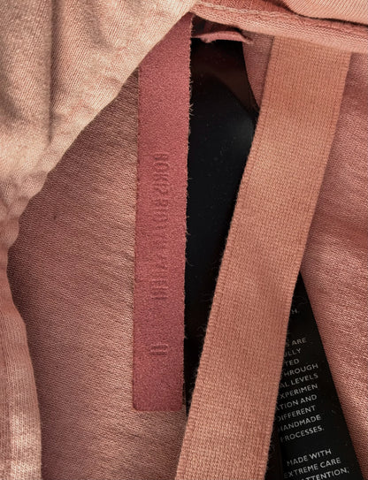 Close-up of a textured fabric with a visible brand label.