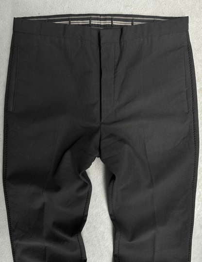 Black pants on a light gray background