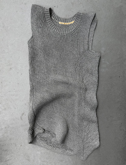 Gray knitted romper on a gray background