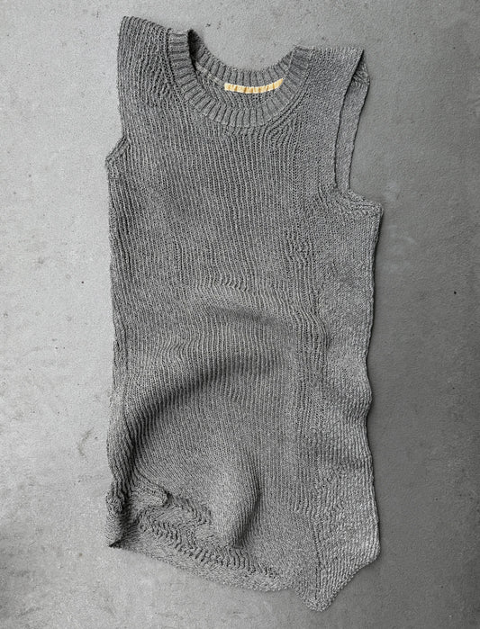 Gray knitted romper on a gray background