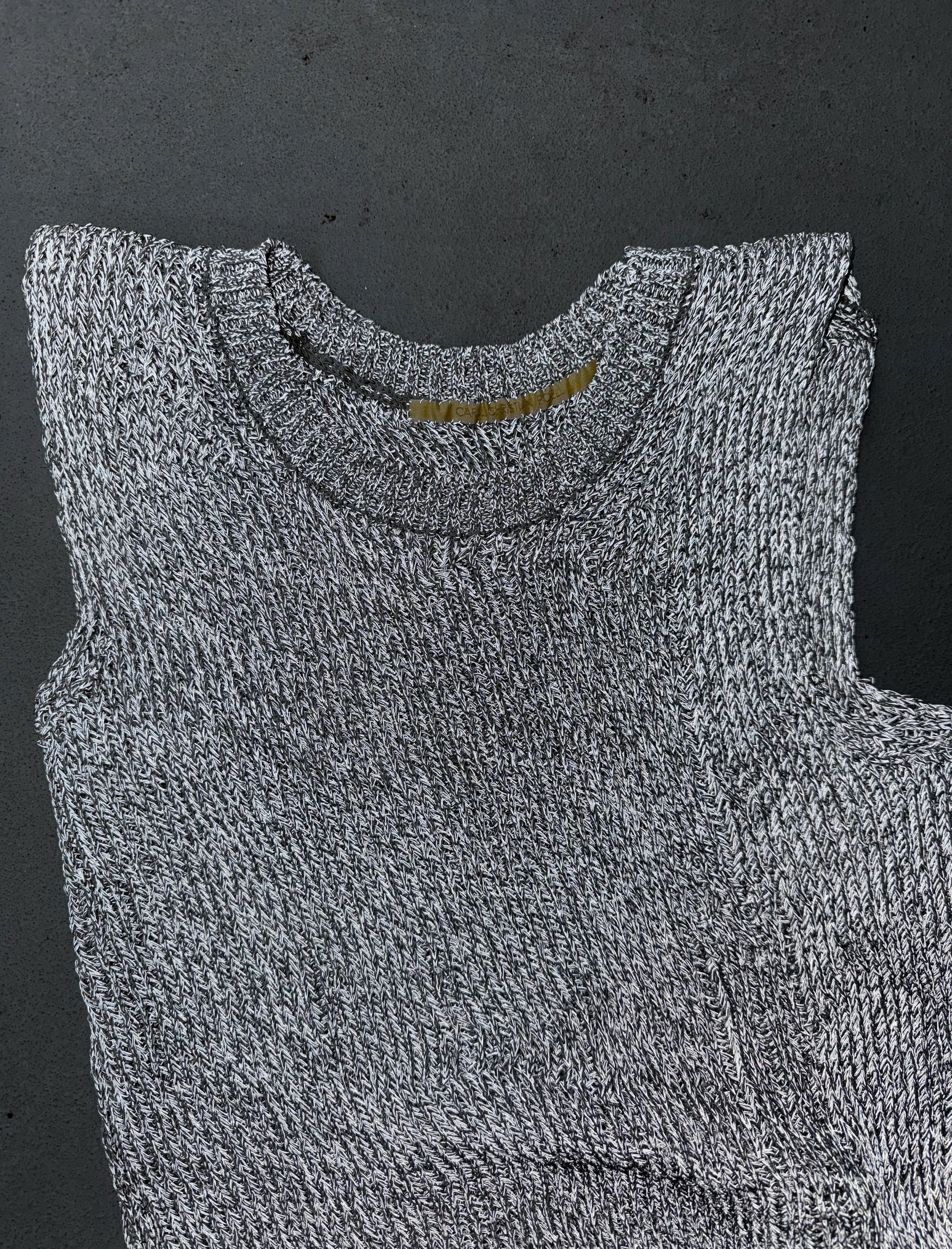 Gray carol sleeveless top on a dark background