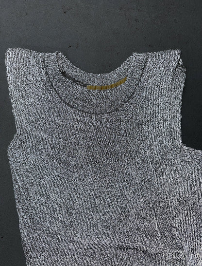 Gray carol sleeveless top on a dark background