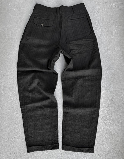Black pants on a gray background