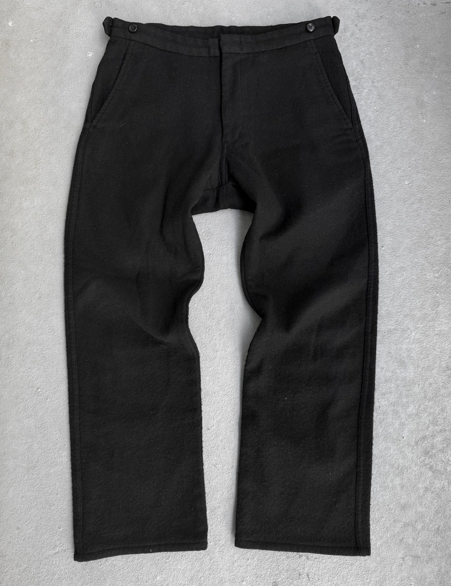 Black pants on a gray background