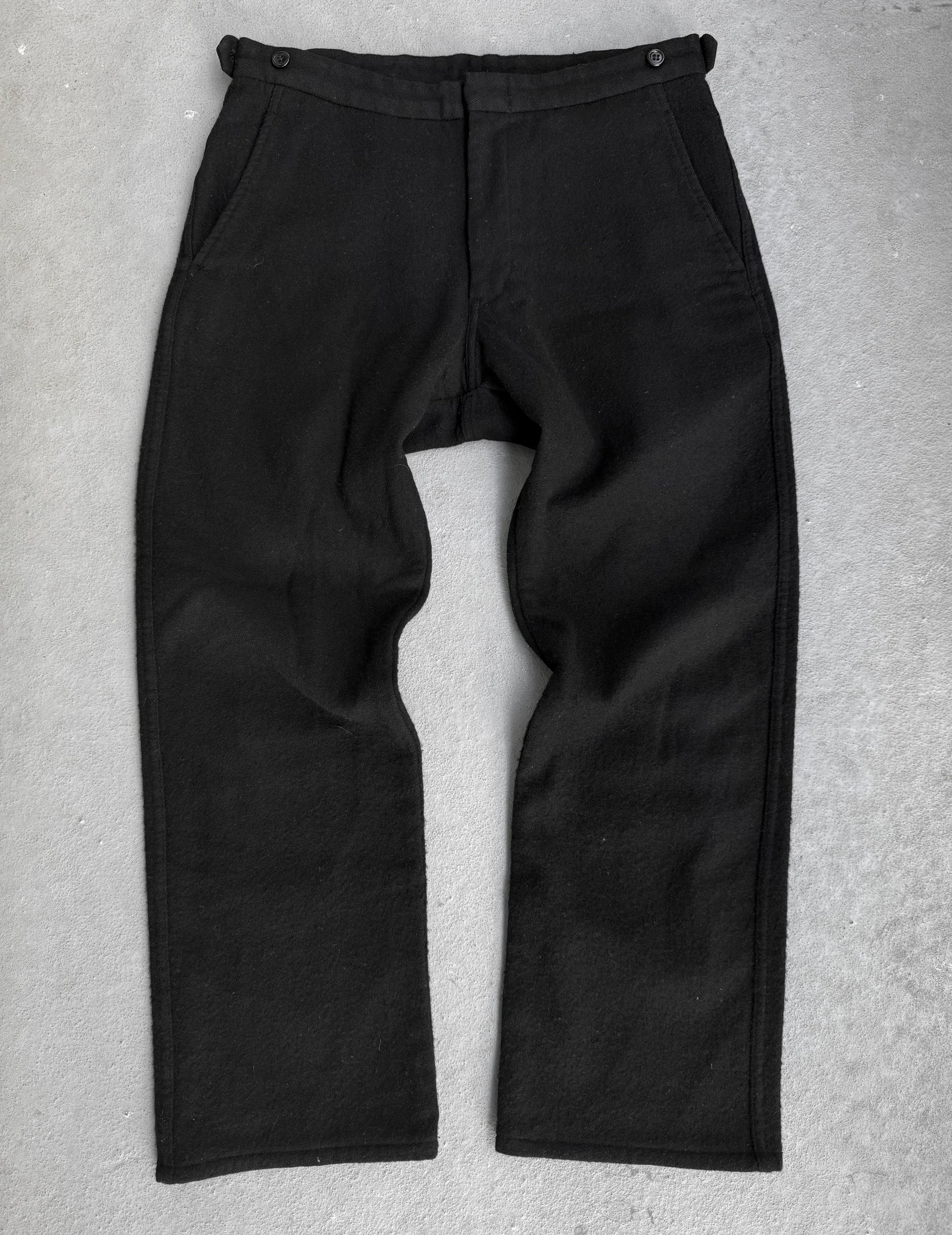 Black pants on a gray background