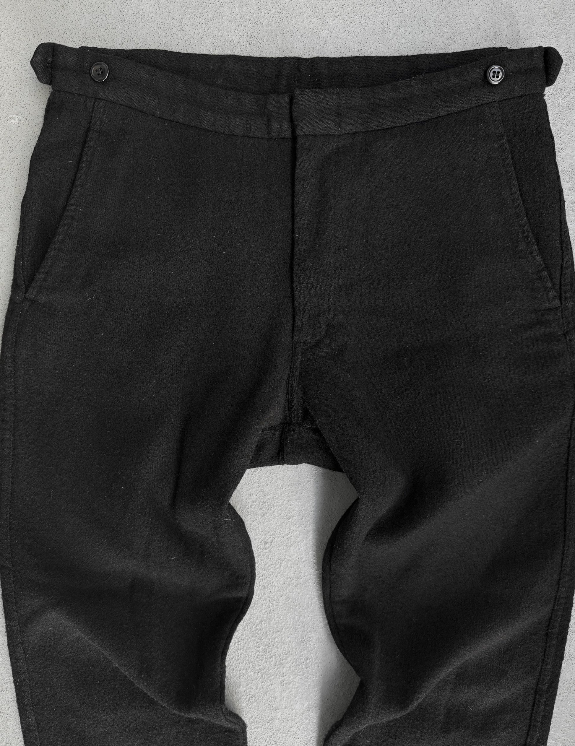 Black pants with a gray background