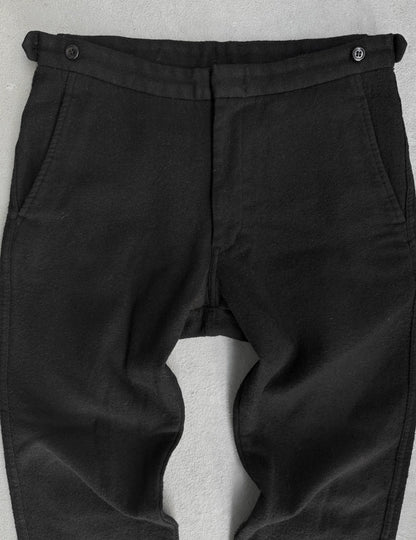 Black pants with a gray background