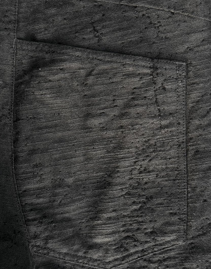 Close-up of a textured black fabric surface