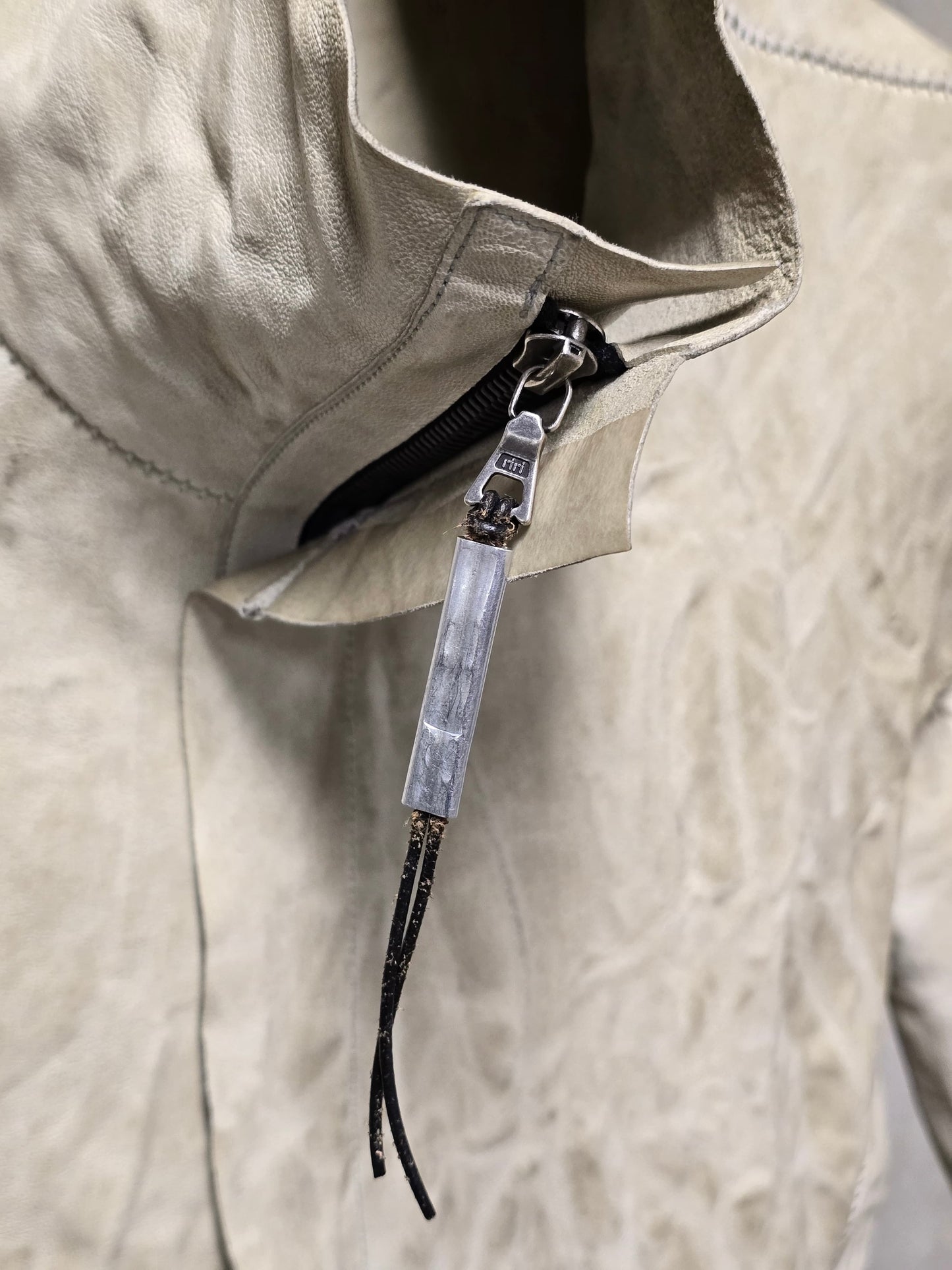 Isaac Sellam: “Experience” Pale Yellow Overlock High Neck Metal Spine Lambskin Leather Jacket