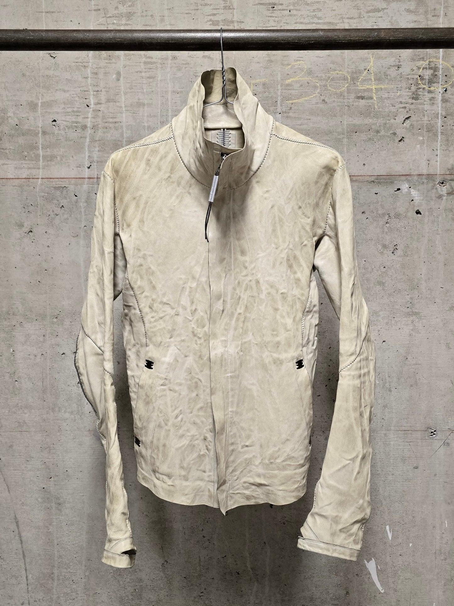 Isaac Sellam: “Experience” Pale Yellow Overlock High Neck Metal Spine Lambskin Leather Jacket