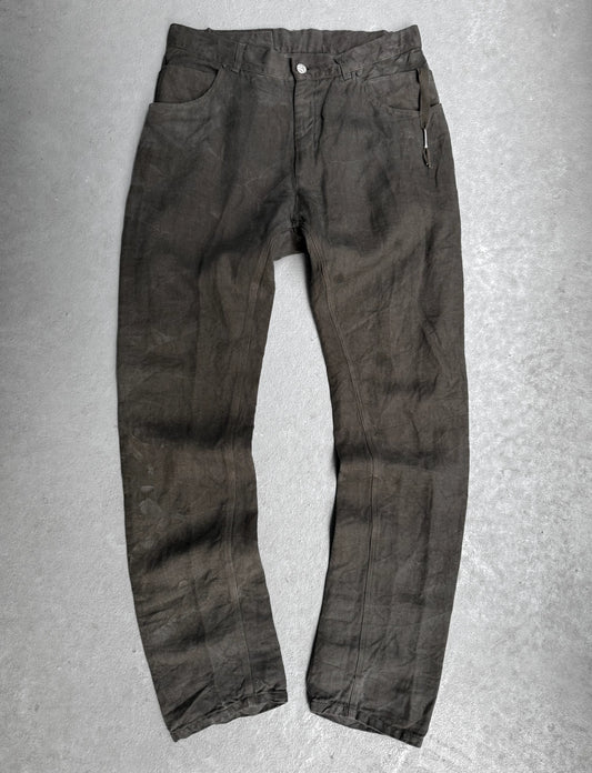 Dark brown pants on a gray background